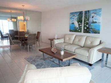 Modern open living room with tiled floors